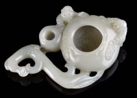 Lot 1039 - A jade brush washer, carved a shallow washer...