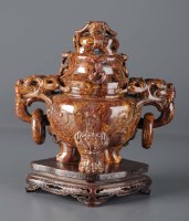 Lot 1046 - A carved hardstone censer and cover, the cover...