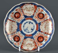 Lot 1071 - An Imari plate, late 19th/early 20th Century,...