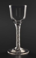 Lot 1082 - An 18th Century wine glass, with ogee bowl...