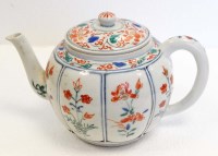 Lot 1094 - A teapot of melon form, painted in Kakiemon...