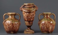 Lot 1100 - A tortoiseshell glazed stoneware garniture, in...