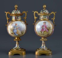 Lot 1105 - A pair of French porcelain and gilt metal...