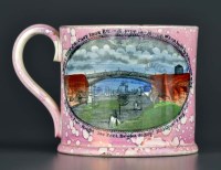 Lot 1145 - A pink lustre tankard, printed and with...