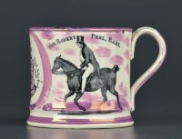 Lot 1146 - A rare pink ink lustre tankard commemorating...