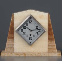 Lot 1187 - A French Art Deco marble mantel timepiece,...