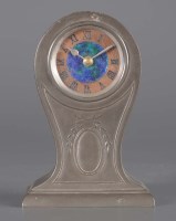 Lot 1201 - A pewter mantel clock, stamped 'Liberty & Co.',...