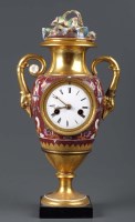 Lot 1203 - A 19th Century French porcelain mantel clock,...