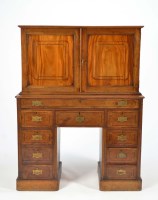 Lot 1208 - An early 19th Century camphor wood pedestal...