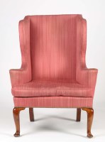 Lot 1210 - A Georgian wing easy chair covered in salmon...