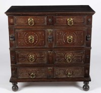 Lot 1213 - A late 17th Century oak graduated four drawer...