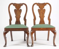 Lot 1215 - A set of six Queen Anne style walnut dining...