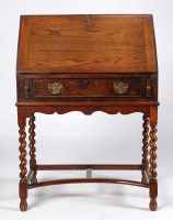 Lot 1224 - A mid 18th Century oak bureau, with a...