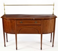 Lot 1256 - A Georgian style mahogany breakfront sideboard...