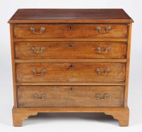 Lot 1273 - A Georgian mahogany chest of four long...