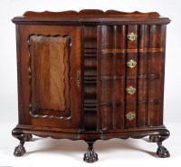 Lot 1300 - A South African stinkwood breakfront cabinet,...