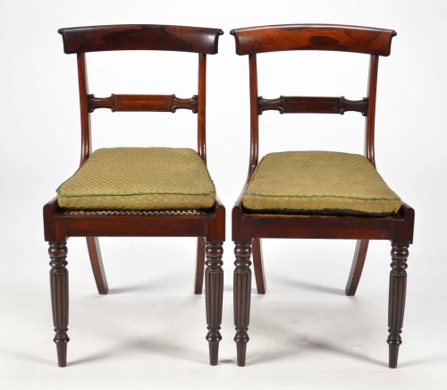 Lot 1303 - A set of four Regency rosewood dining chairs,...