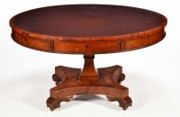 Lot 1315 - A late Georgian mahogany drum table, with...