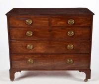 Lot 1321 - A George III mahogany chest of two short and...