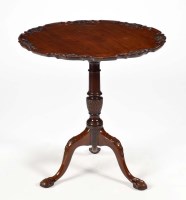 Lot 1330 - A Georgian mahogany circular tip-up-top...