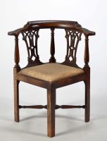 Lot 1347 - A late 18th Century oak corner chair, with...