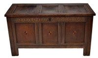 Lot 1352 - A 17th Century oak coffer with panel hinged...