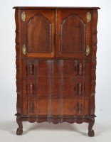 Lot 1354 - A South African stinkwood cupboard-on-chest,...