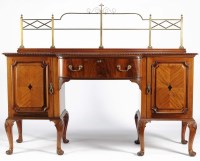 Lot 1361 - A mahogany breakfront sideboard with raised...