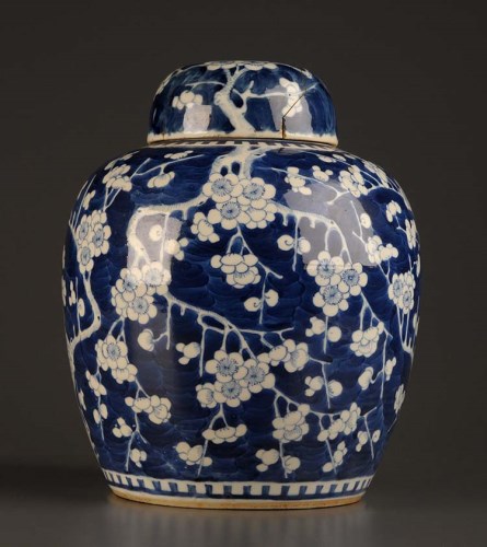 Lot 2 - A blue and white ginger jar, painted with...