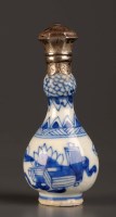 Lot 12 - An 18th Century blue and white miniature vase,...