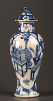 Lot 34 - A 19th Century blue and white baluster vase,...
