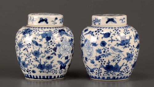 Lot 35 - A pair of blue and white ginger jars, painted...