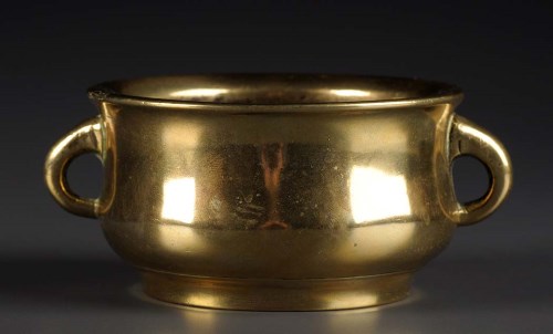 Lot 52 - A bronze censer, of baluster form, with loop...