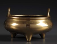 Lot 53 - A bronze censer, of bombé form, with twin loop...