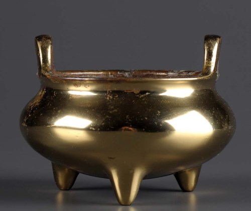 Lot 54 - A bronze censer, of baluster form, with twin...