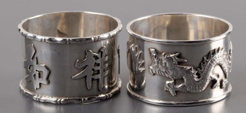 Lot 66 - Two Chinese silver napkin rings, by Wang Hing,...