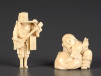 Lot 80 - A carved ivory netsuke of a man playing...