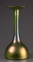 Lot 109 - A Dresser style glass vase, green iridescent...