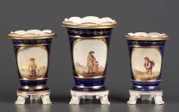 Lot 143 - A garniture of three vases, circa 1830,...