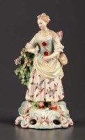Lot 145 - An 18th Century Derby figure of a female...