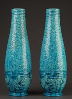 Lot 156 - Burmantoft: a pair of turquoise glazed vases,...