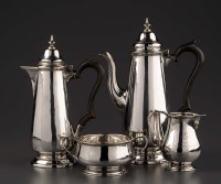 Lot 533 - A George V matched four-piece tea service, by...