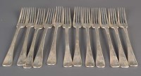 Lot 571 - A set of twelve Victorian table forks, by Reid...