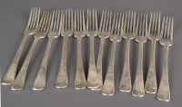 Lot 572 - A set of twelve Victorian table forks, by Reid...