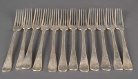 Lot 573 - A set of twelve Victorian table forks, by Reid...