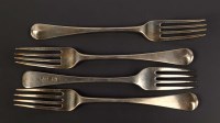 Lot 588 - Eight George III table forks, by Thomas Watson,...