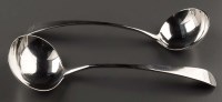 Lot 590 - A pair of George III sauce ladles, by Peter,...