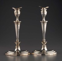 Lot 599 - A pair of George V candlesticks, by The...