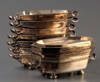 Lot 604 - Eight electroplated two-handled shaped...