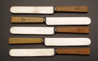 Lot 626 - A set of twelve tea knives, the ivory handles...